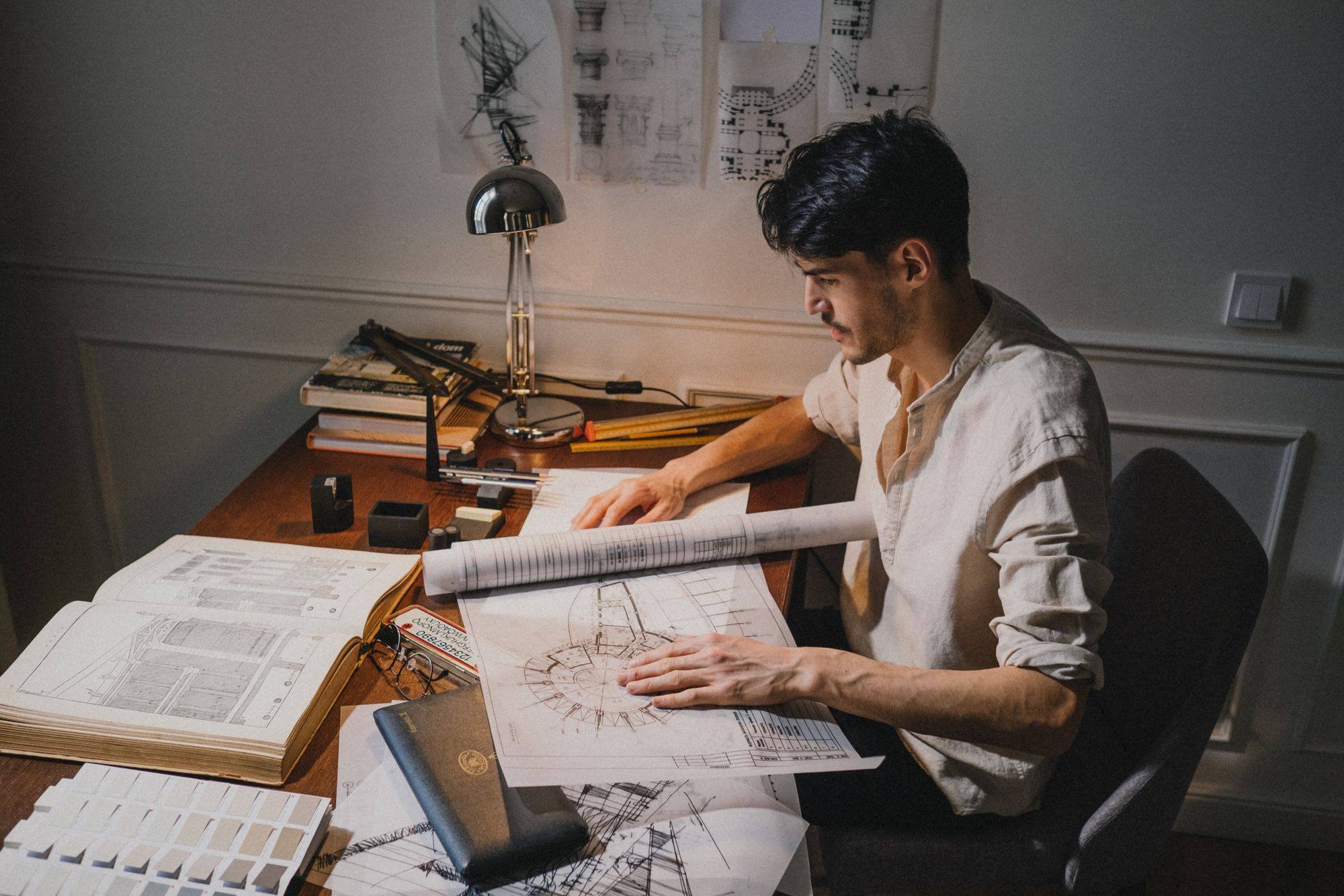 A design studio with drawings and materials used for planning a building project
