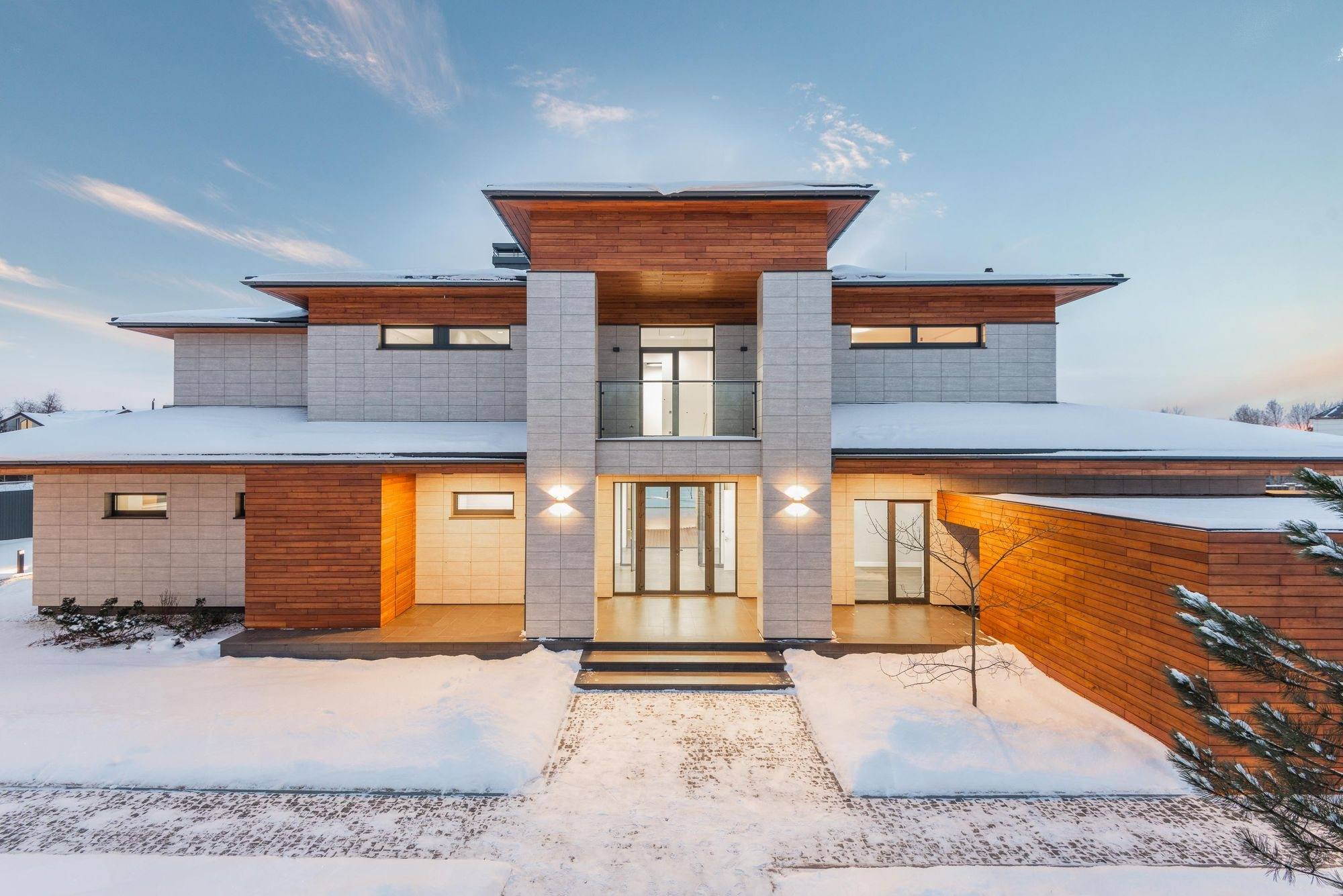 A snow-covered house illustrating the exposed surfaces of a winter home