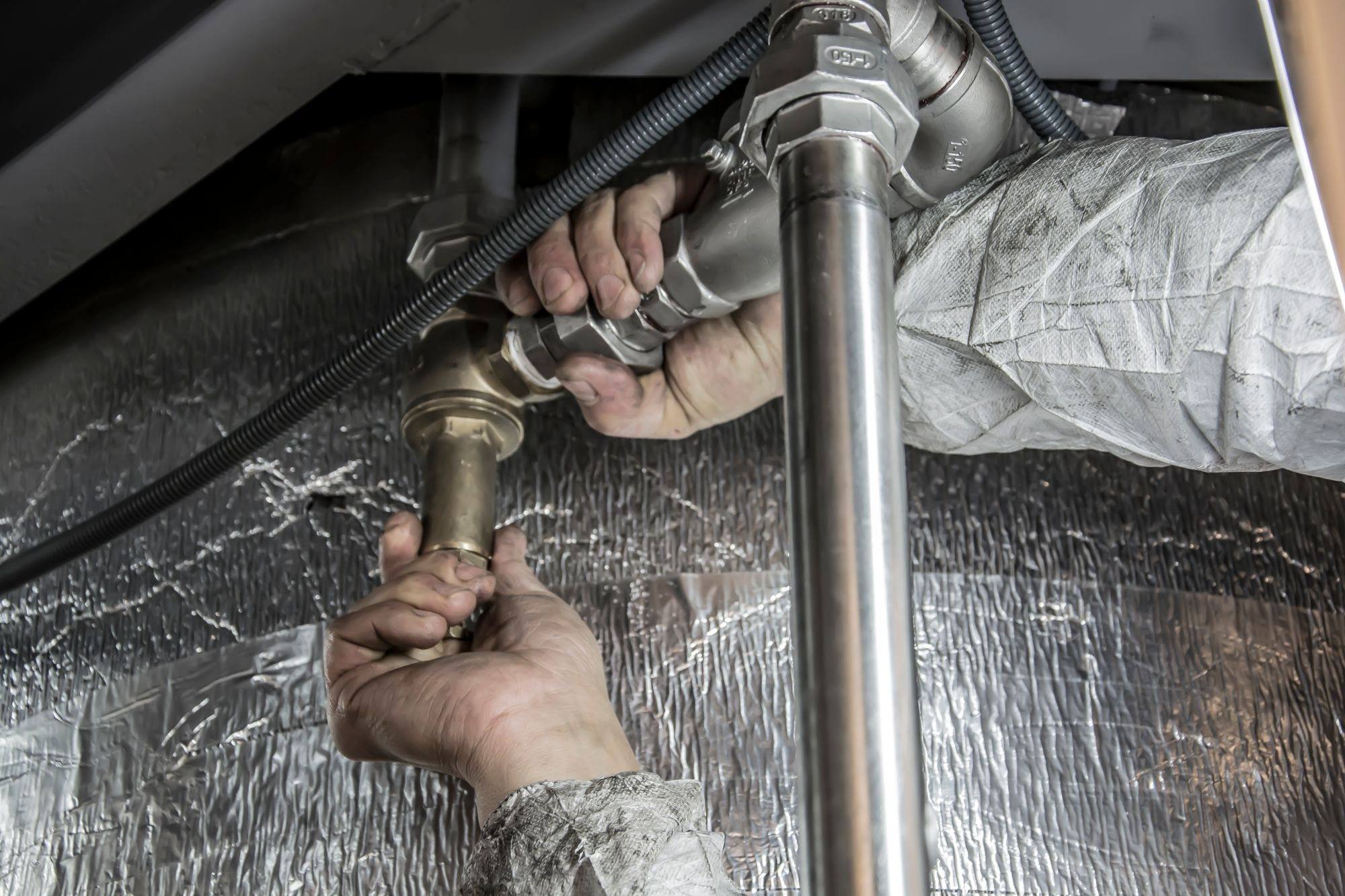 A plumber fitting pipework